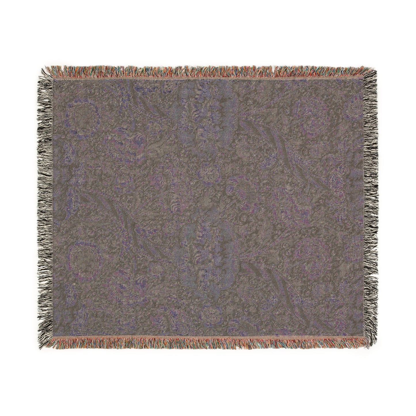 A woven cotton blanket with a geometric William Morris & Co pattern in shades of gray and a colourful fringe along the edges.