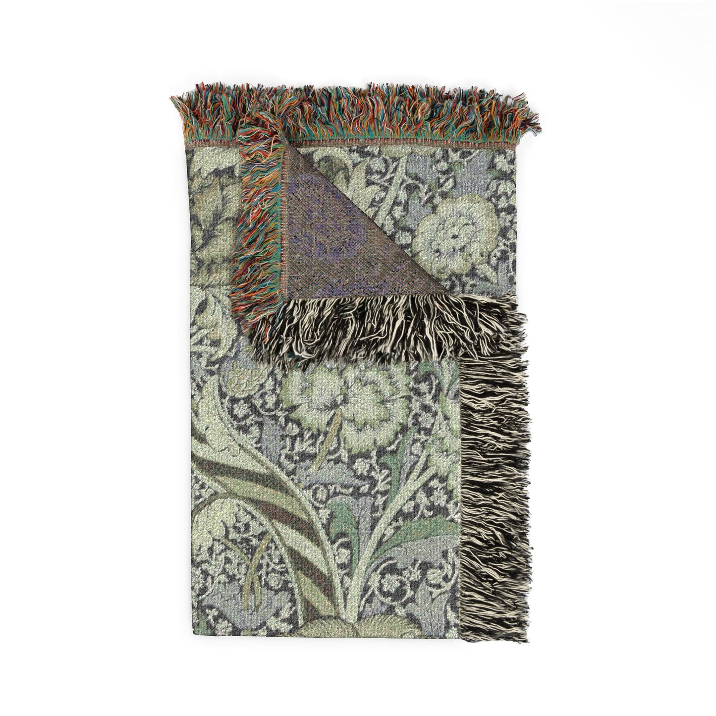 Patterned throw blanket with fringes on a white background