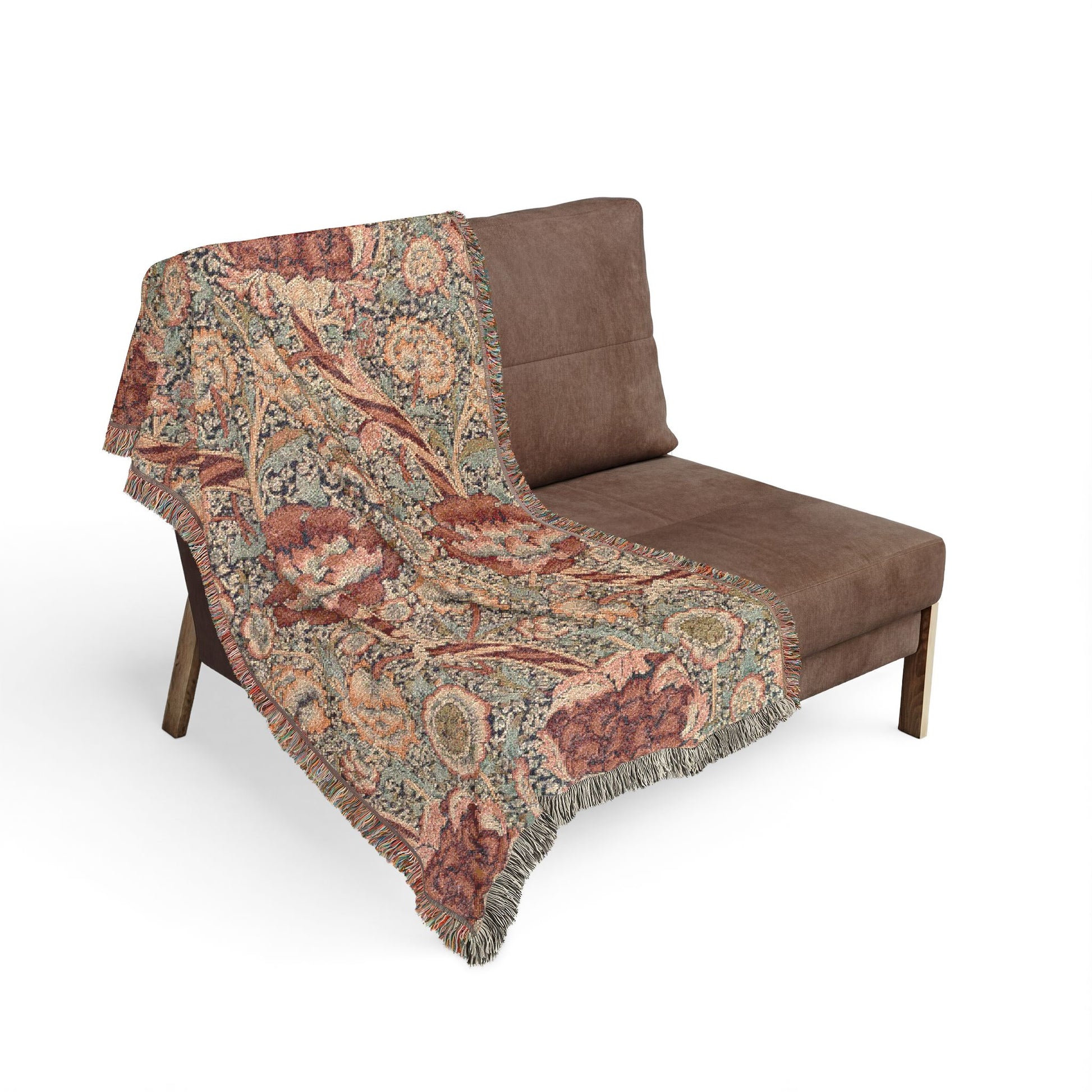 Brown patterned throw blanket draped over a brown chair on a white background