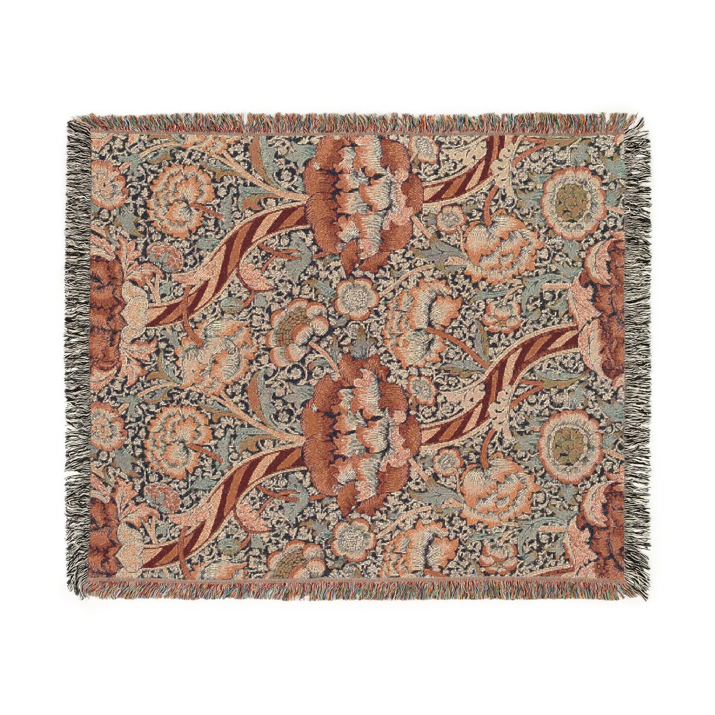 A woven cotton blanket with a geometric and floral William Morris & Co pattern in red, blue, beige, and brown colours, with fringed edges.
