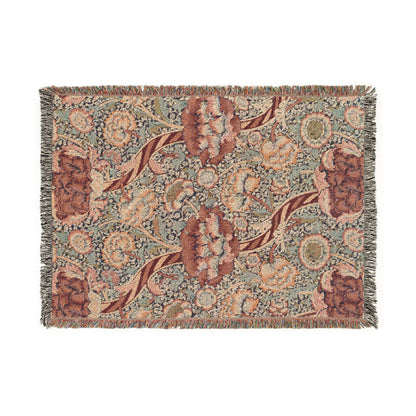 Floral patterned throw blanket with brown and beige flowers on a light background
