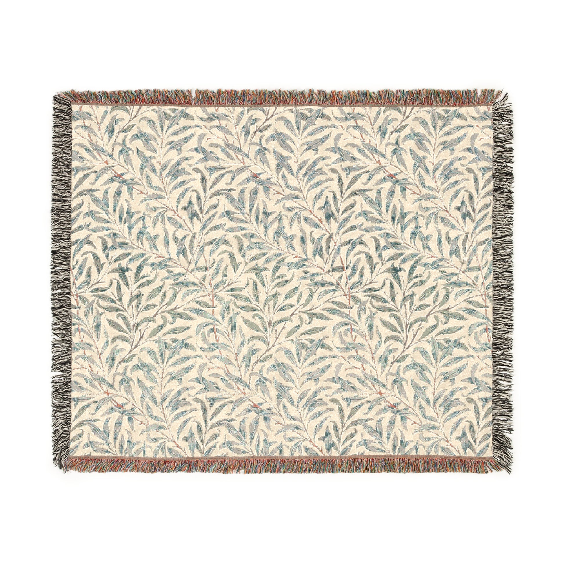 A rectangular woven cotton blanket with a floral pattern in subtle colors, featuring a colorful fringed edge.