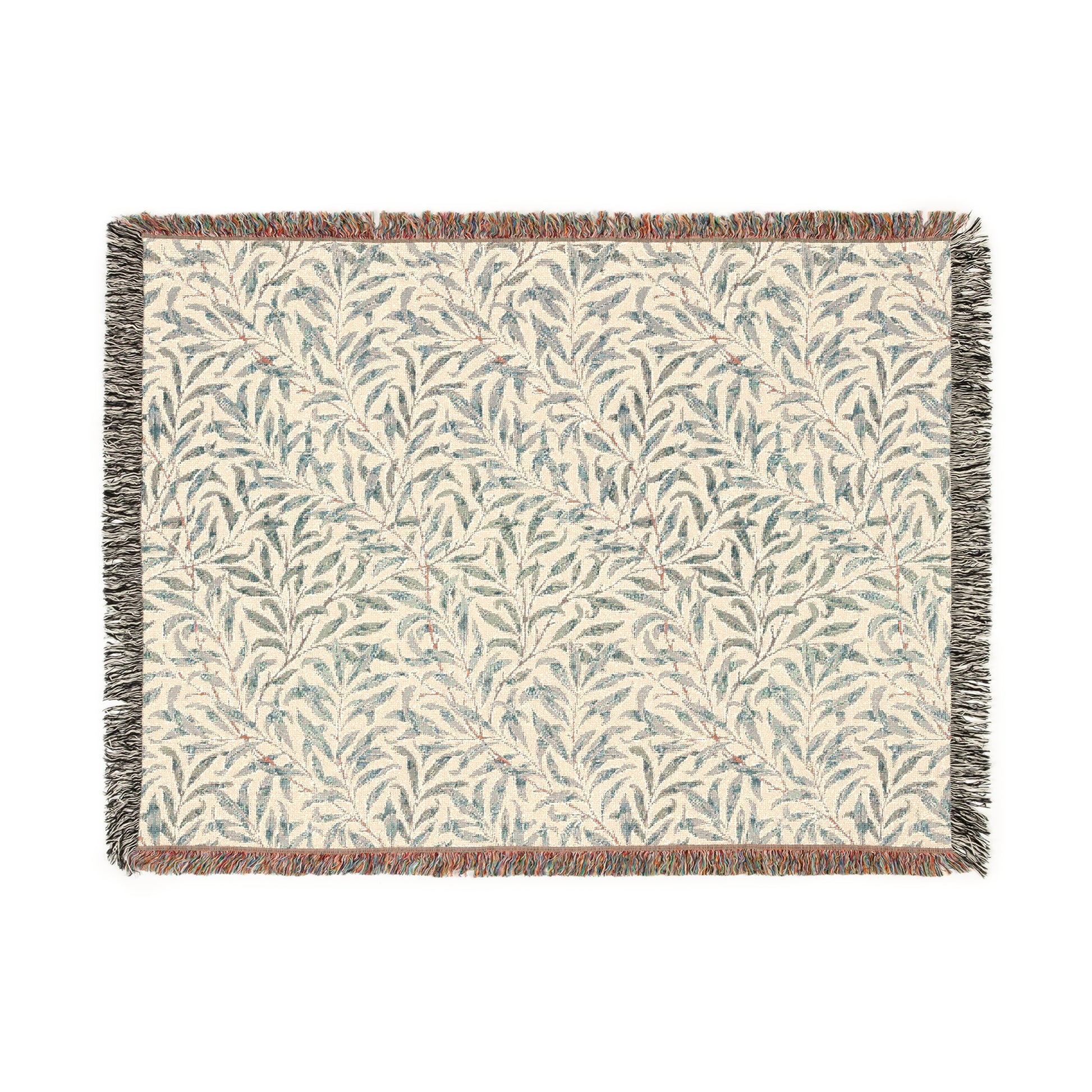 A rectangular woven cotton blanket with a floral pattern in subtle colors, featuring a colorful fringed edge.