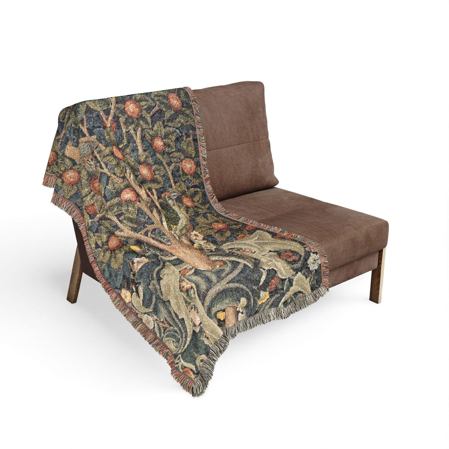 Brown chair with a decorative tapestry blanket featuring nature-themed design.