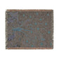 Decorative throw blanket with intricate pattern on a white background