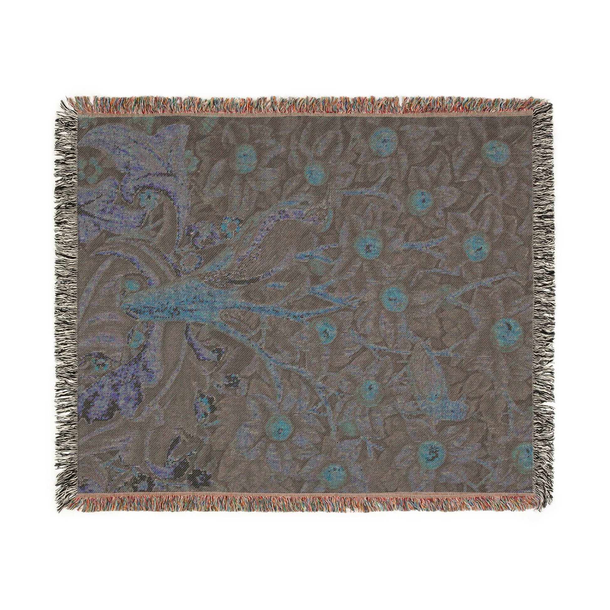 Decorative throw blanket with intricate pattern on a white background