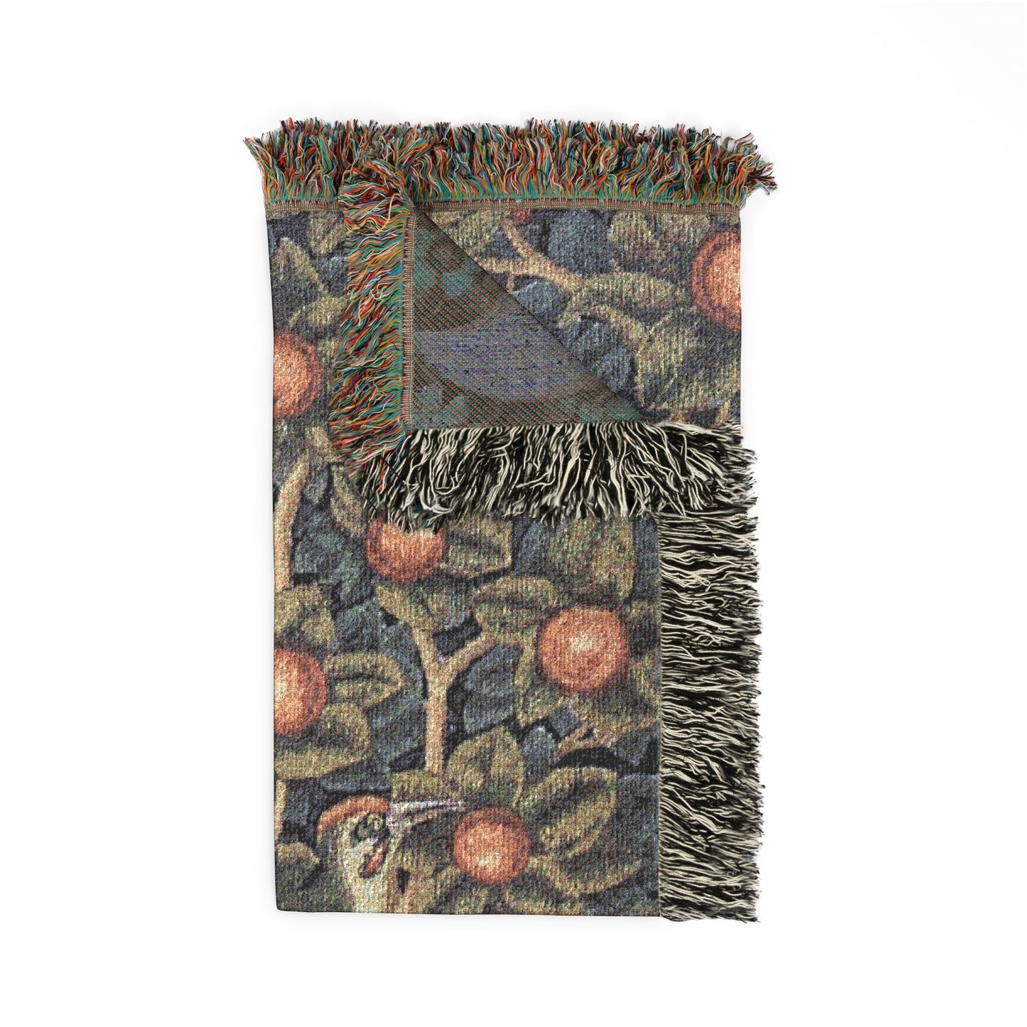 Decorative throw blanket with bird and floral pattern on a white background