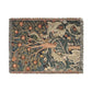 A woven cotton blanket with a floral and bird pattern, featuring a colorful fringe.