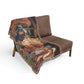 Brown chair with a decorative tapestry blanket featuring a religious scene on a white background