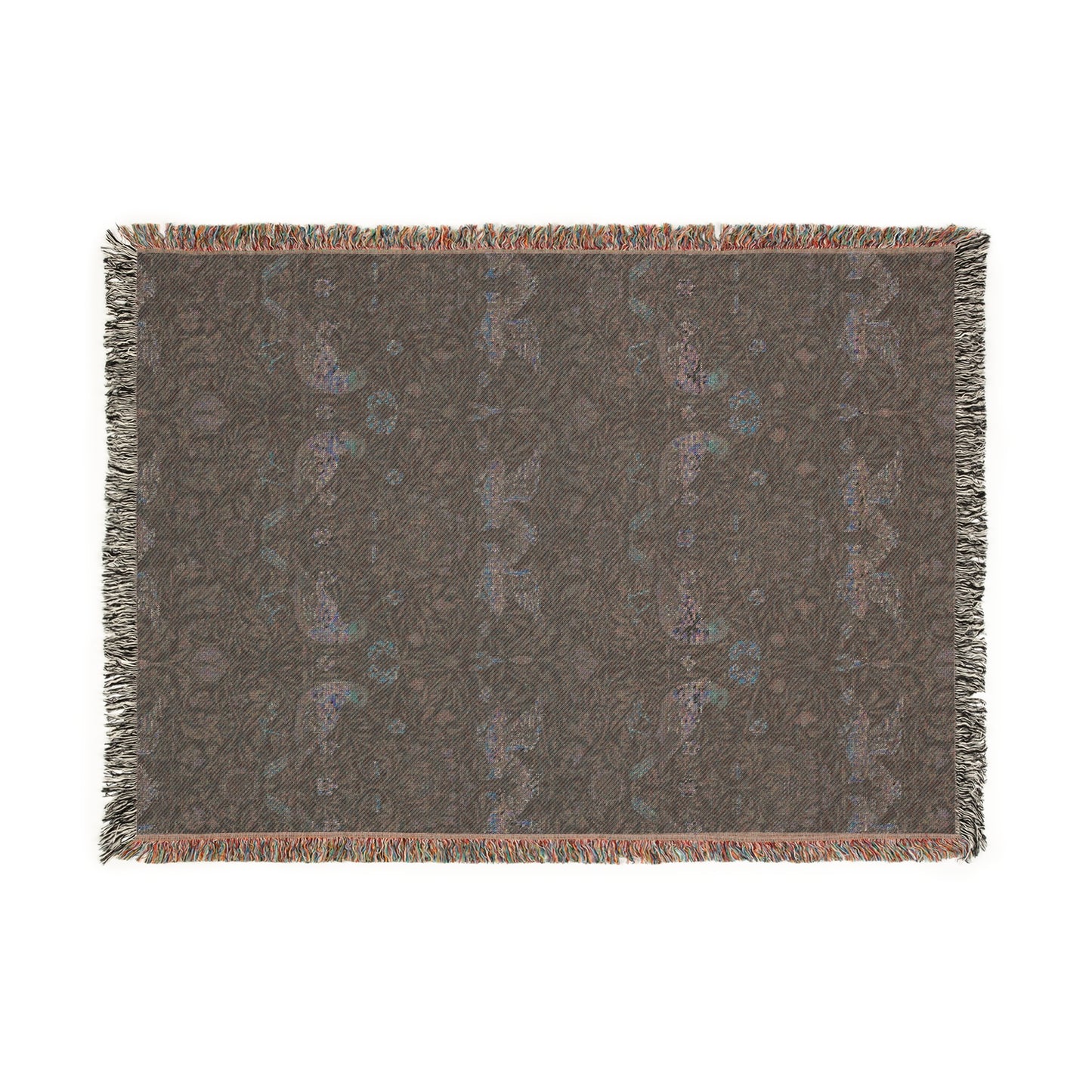 A woven cotton blanket with a geometric William Morris & Co pattern in shades of blue and a fringed edge.