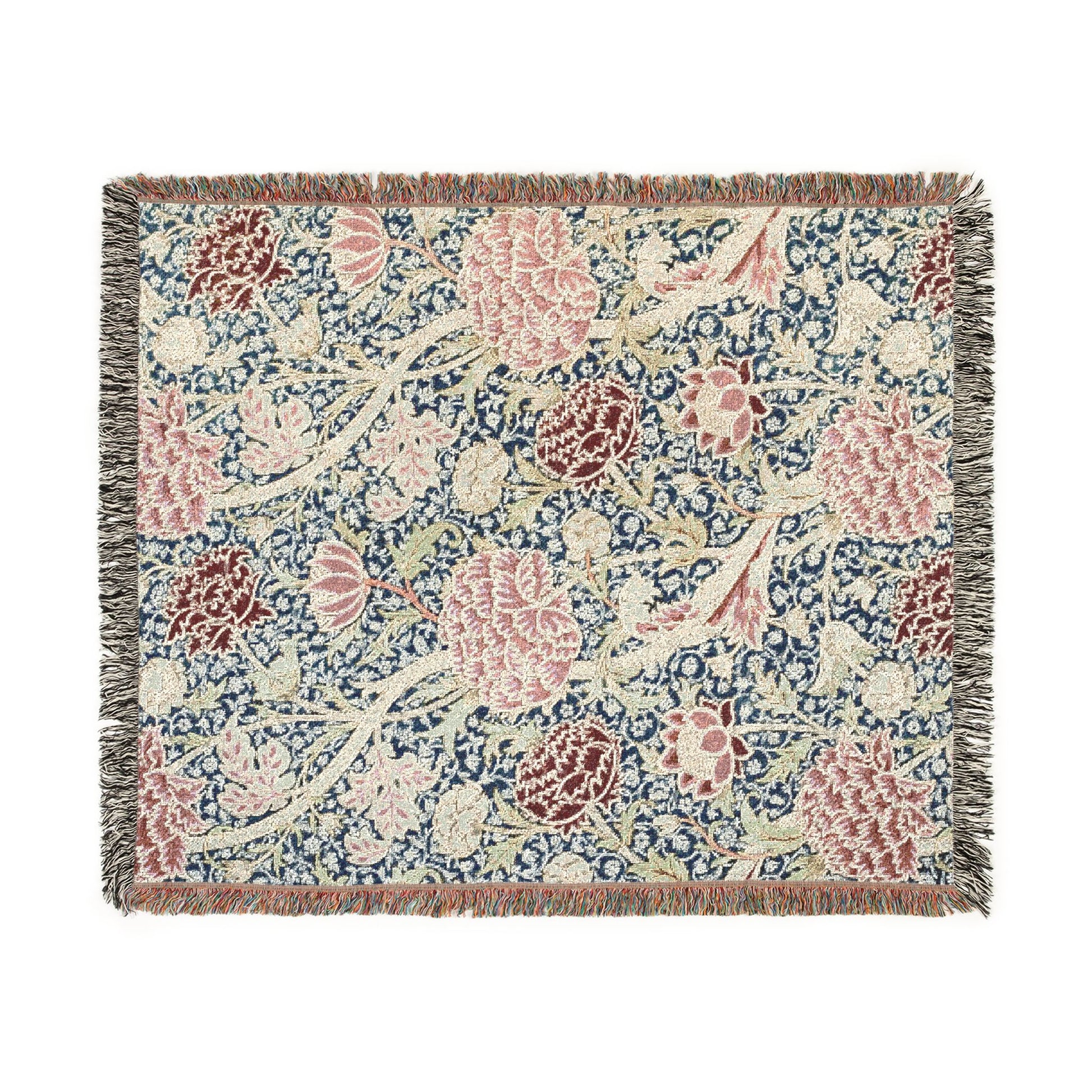Floral patterned throw blanket with fringe on a white background