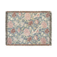 Floral patterned throw blanket with fringe on a white background