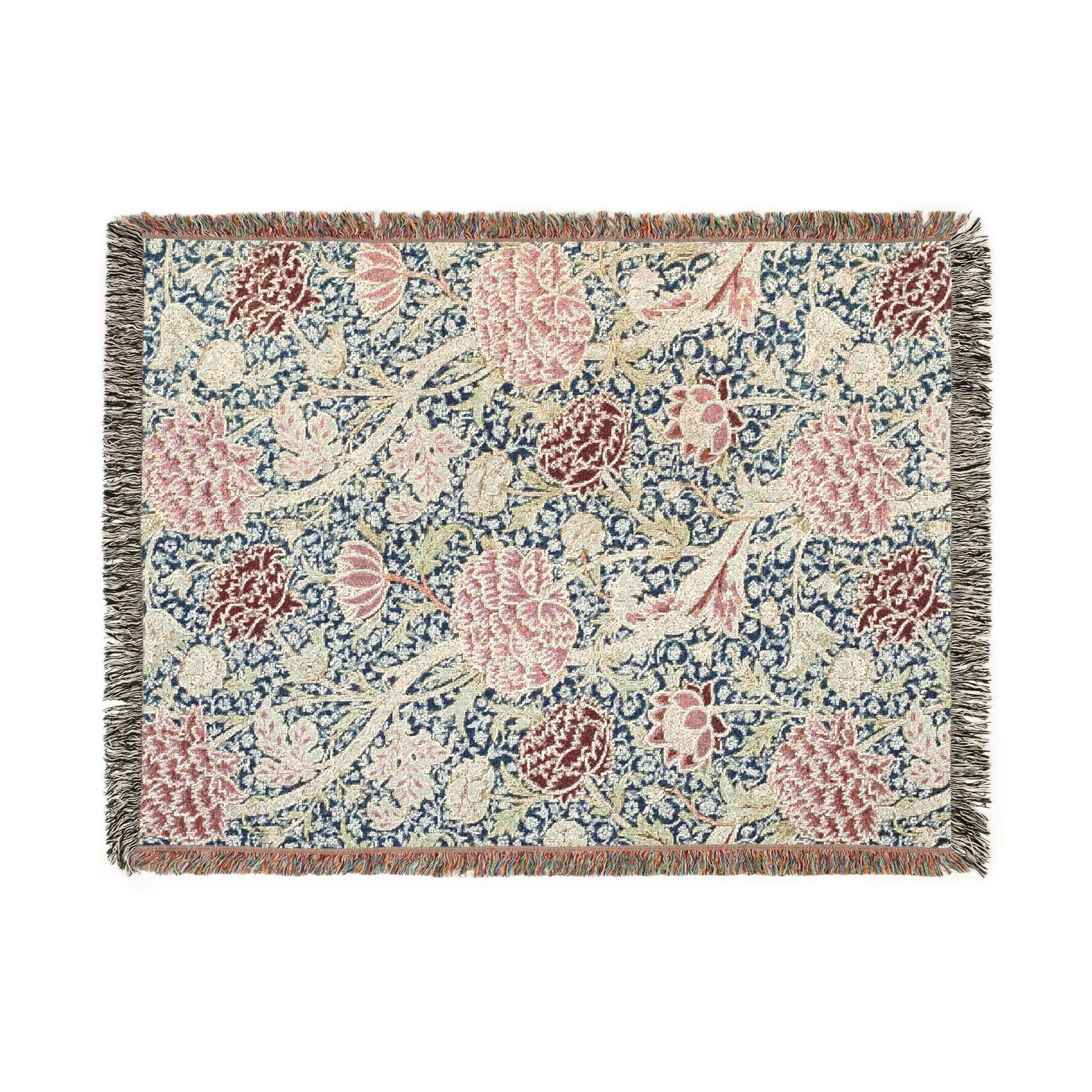 Floral patterned throw blanket with fringe on a white background