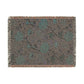 Floral patterned throw blanket with fringe on a white background
