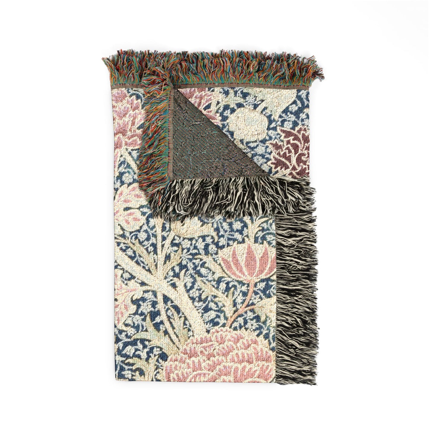 Floral patterned rug with fringe on a white background