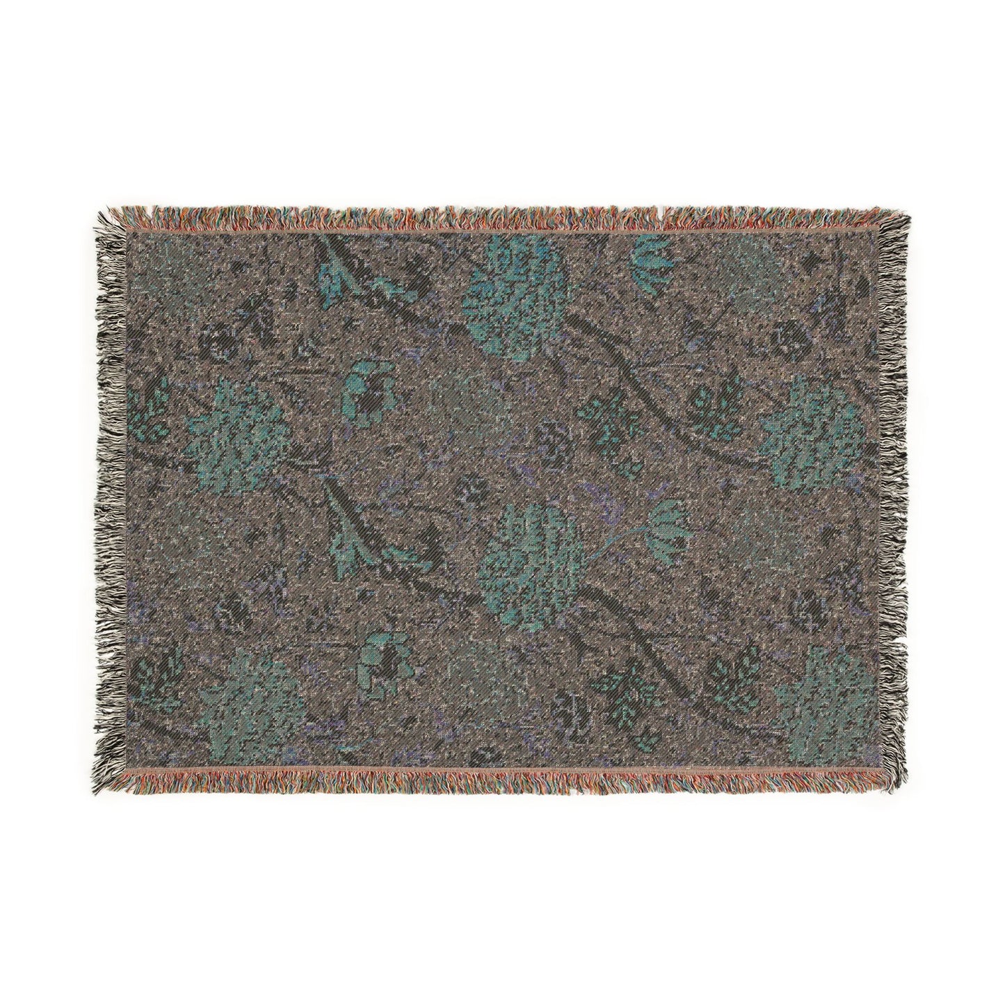 Floral patterned rug with fringe on a white background