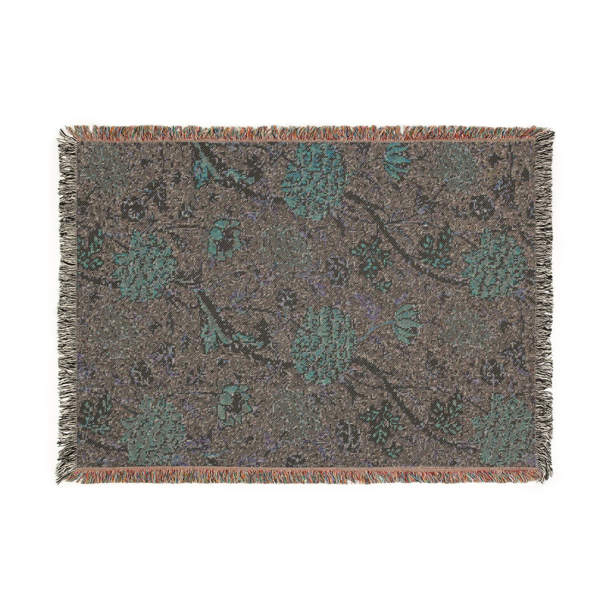 Floral patterned rug with fringe on a white background