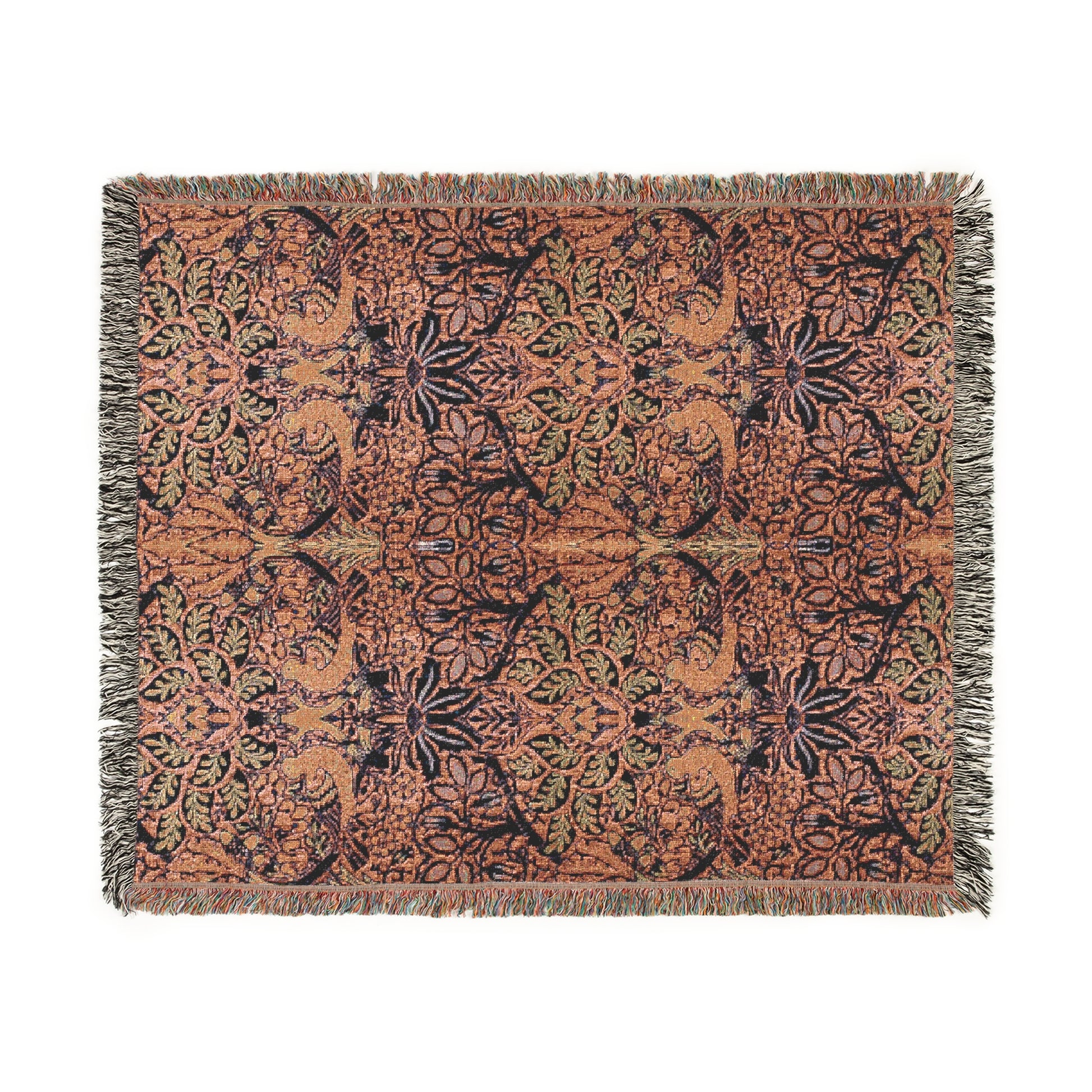 A floral woven blanket with fringed edges displayed on a white background.