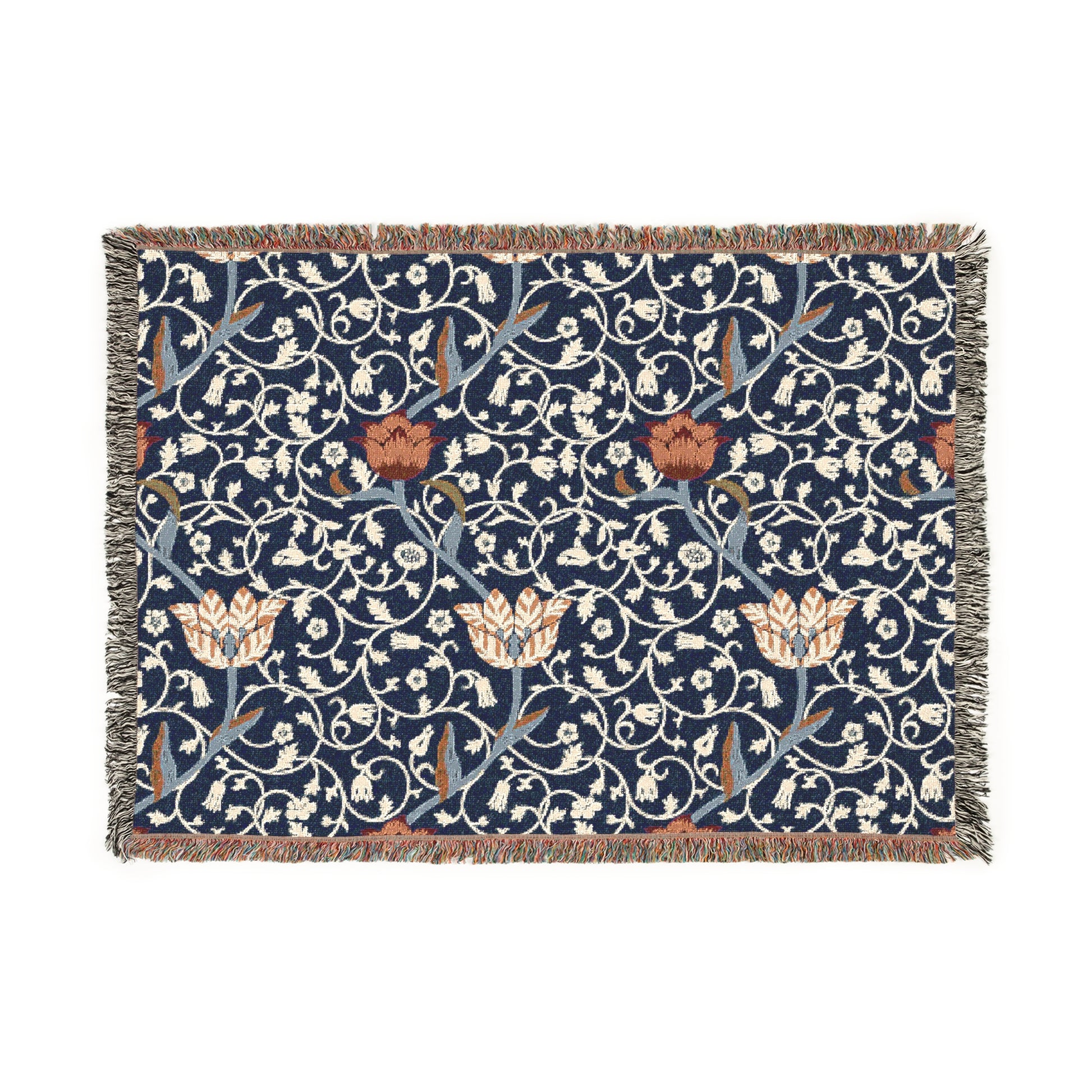 A woven cotton blanket with a geometric William Morris & Co pattern in blue, red and white colours, featuring fringed edges.