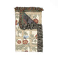 Decorative rug with floral pattern and fringed edge on a white background