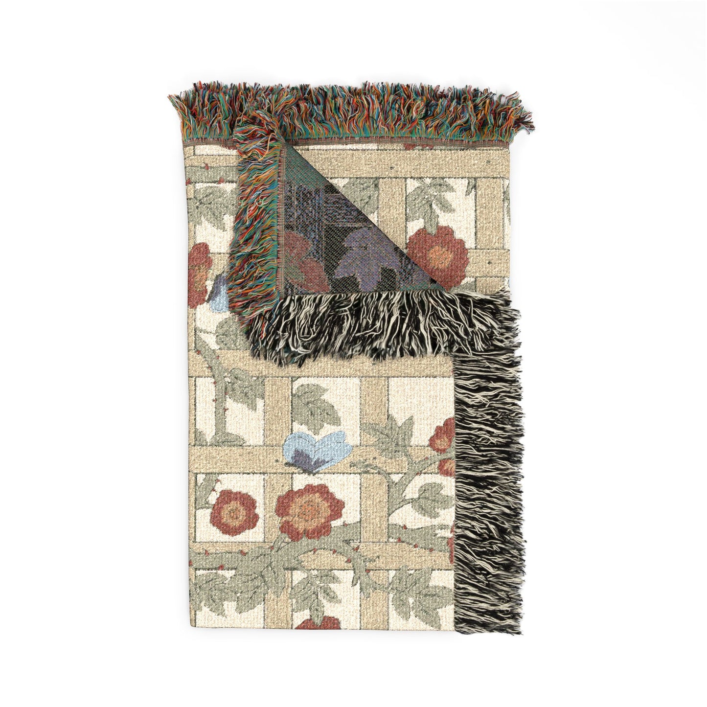 Decorative rug with floral pattern and fringed edge on a white background