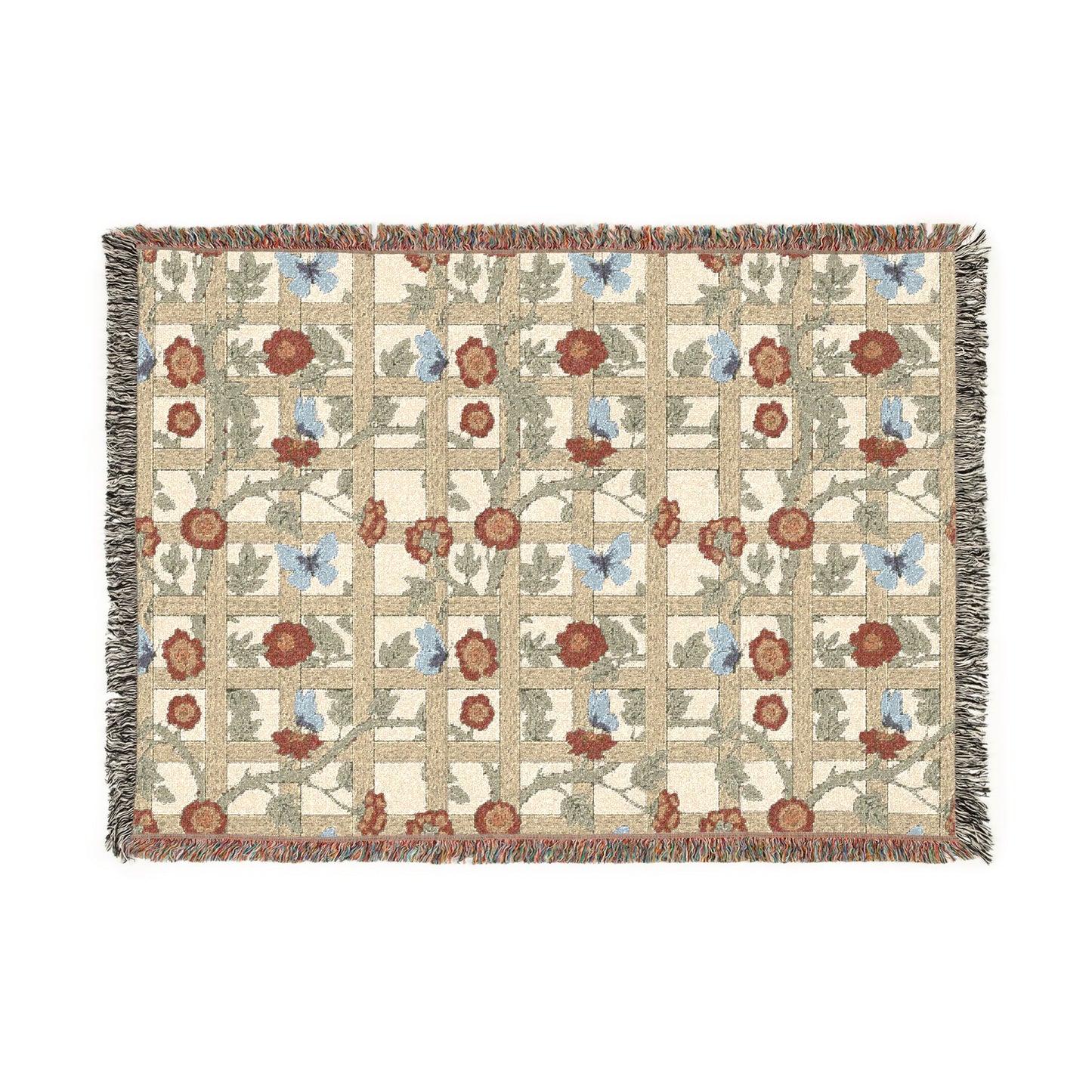 Floral and butterfly patterned throw blanket on a white background