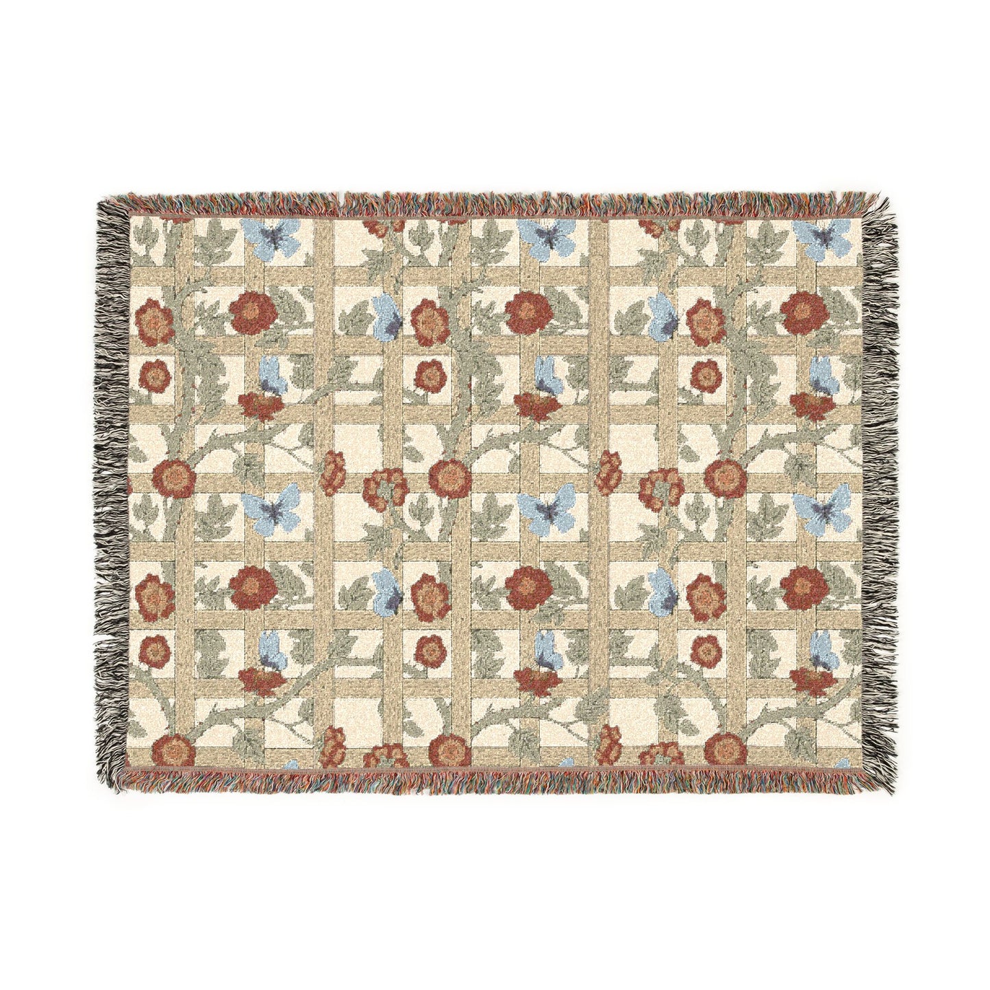 Woven blanket with floral and butterfly pattern on a white background