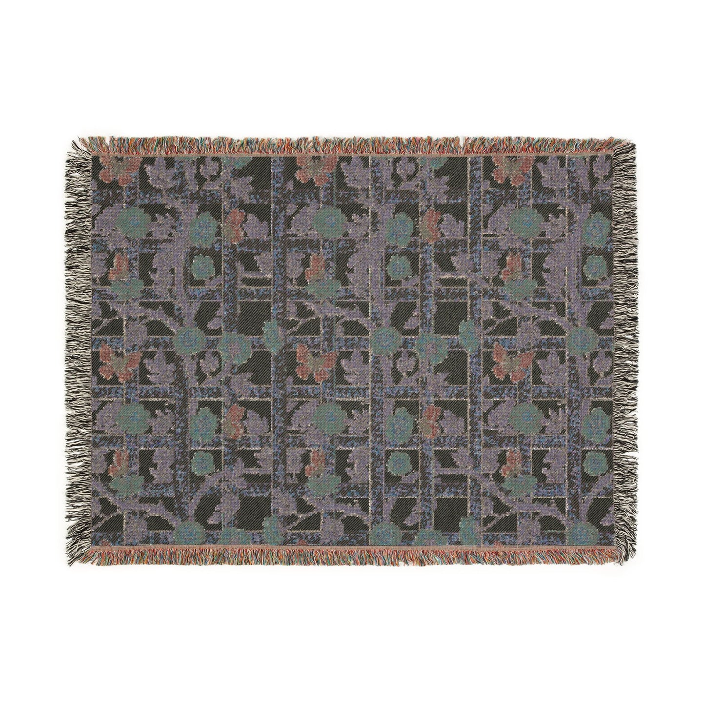 Patterned throw blanket with fringe on a white background