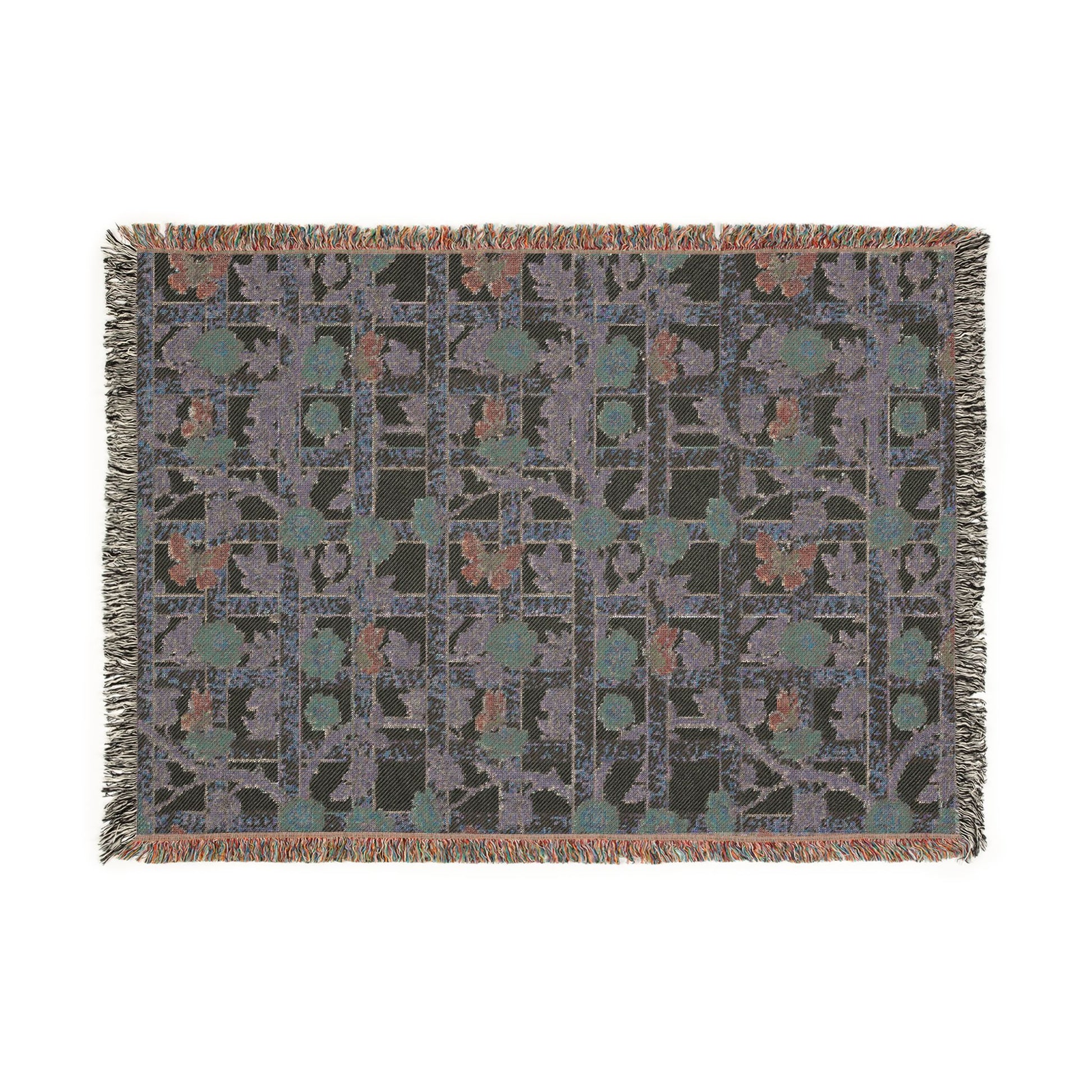 Patterned throw blanket with geometric design on a white background