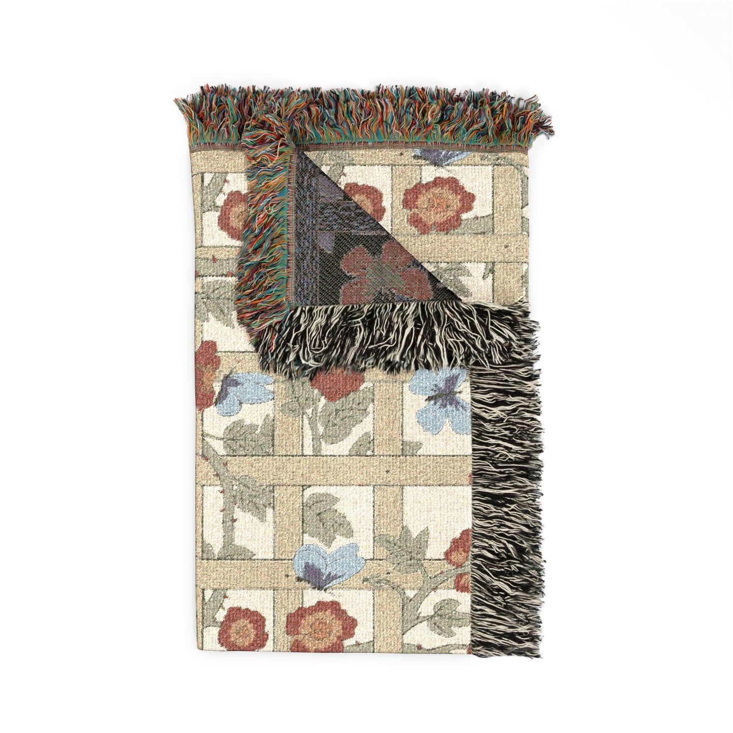 Textile with fringe and geometric design on a white background