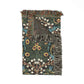 Floral patterned throw blanket with fringes on a white background