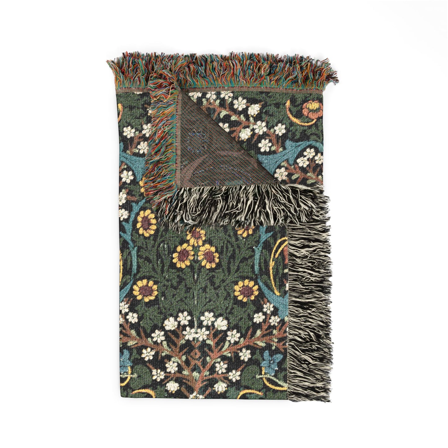 Floral patterned throw blanket with fringes on a white background