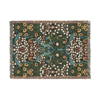 Decorative throw blanket with floral pattern on a white background