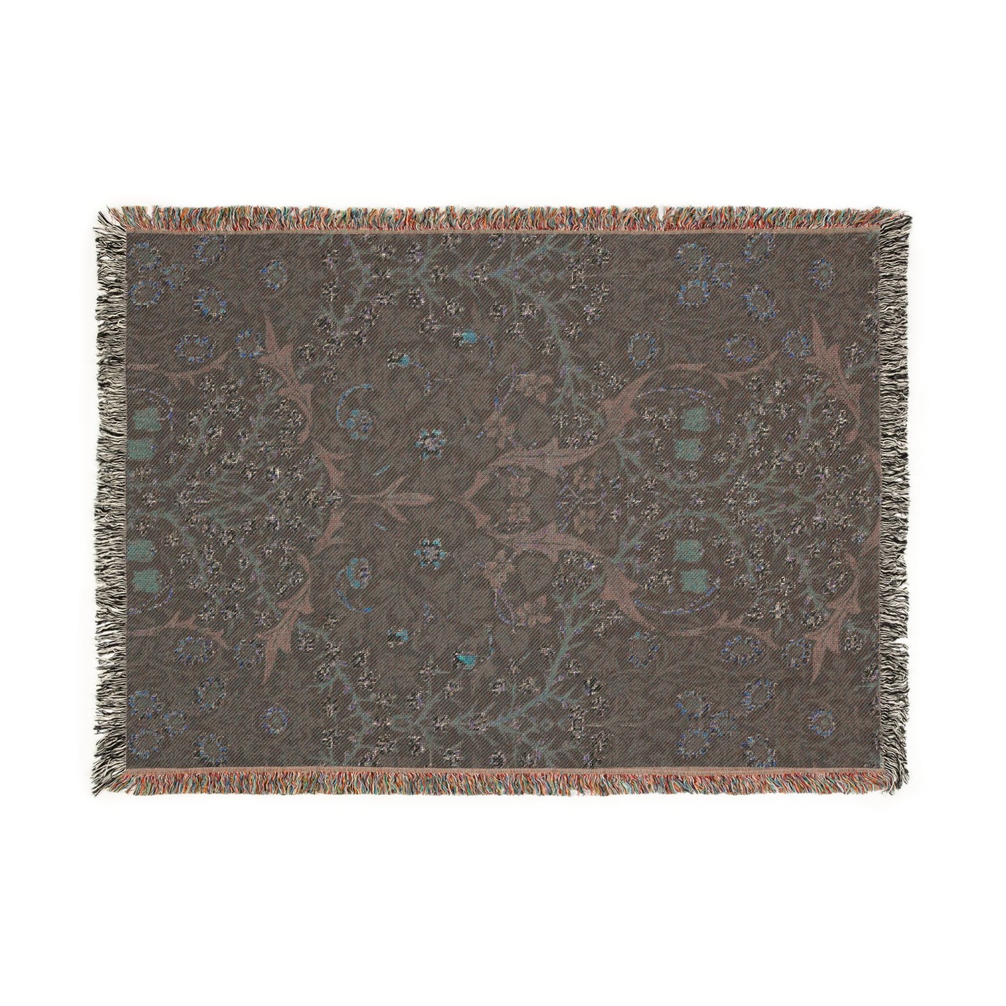 Decorative throw blanket with intricate pattern on a white background