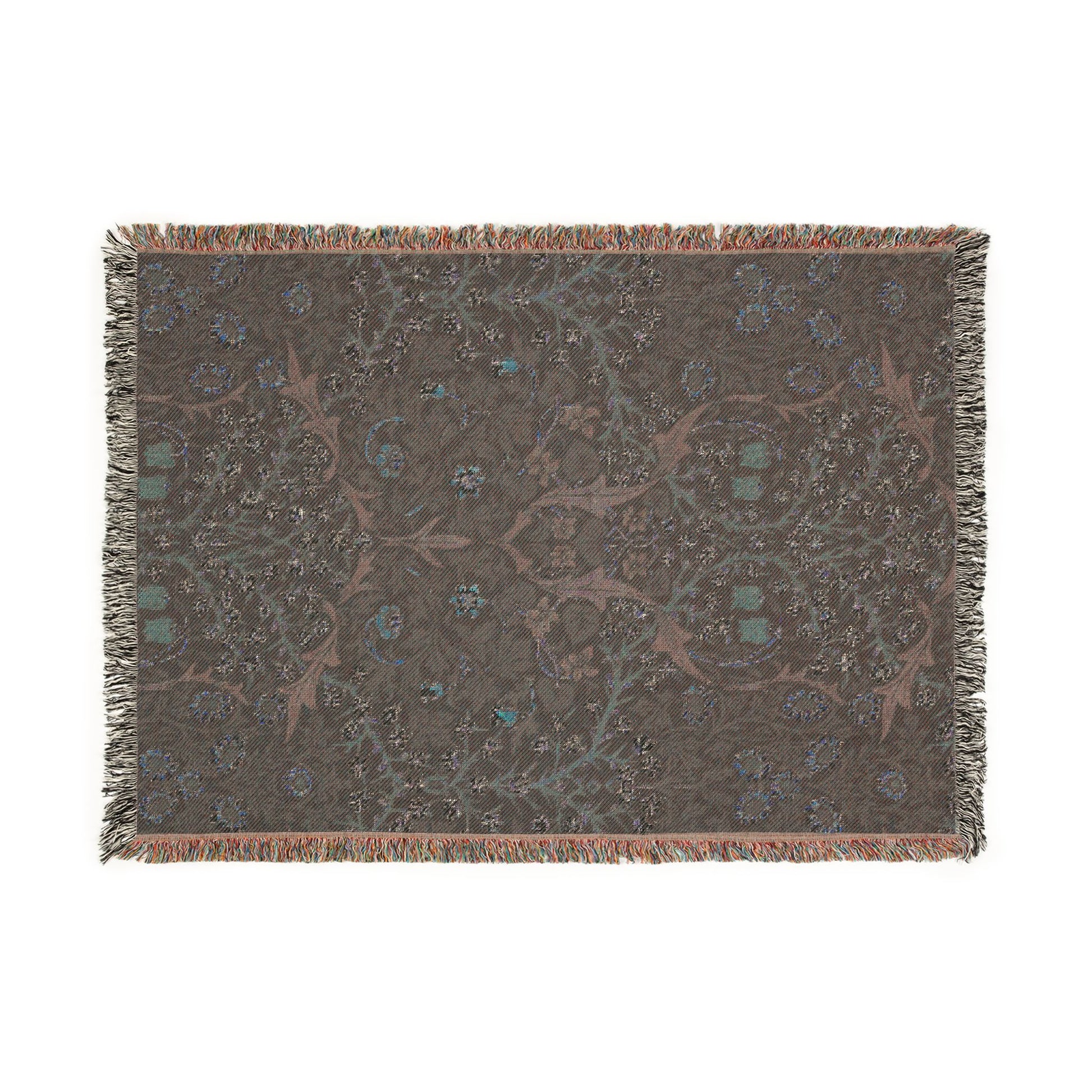 Decorative throw blanket with intricate pattern on a white background