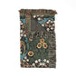 Floral patterned throw blanket with fringe on a white background