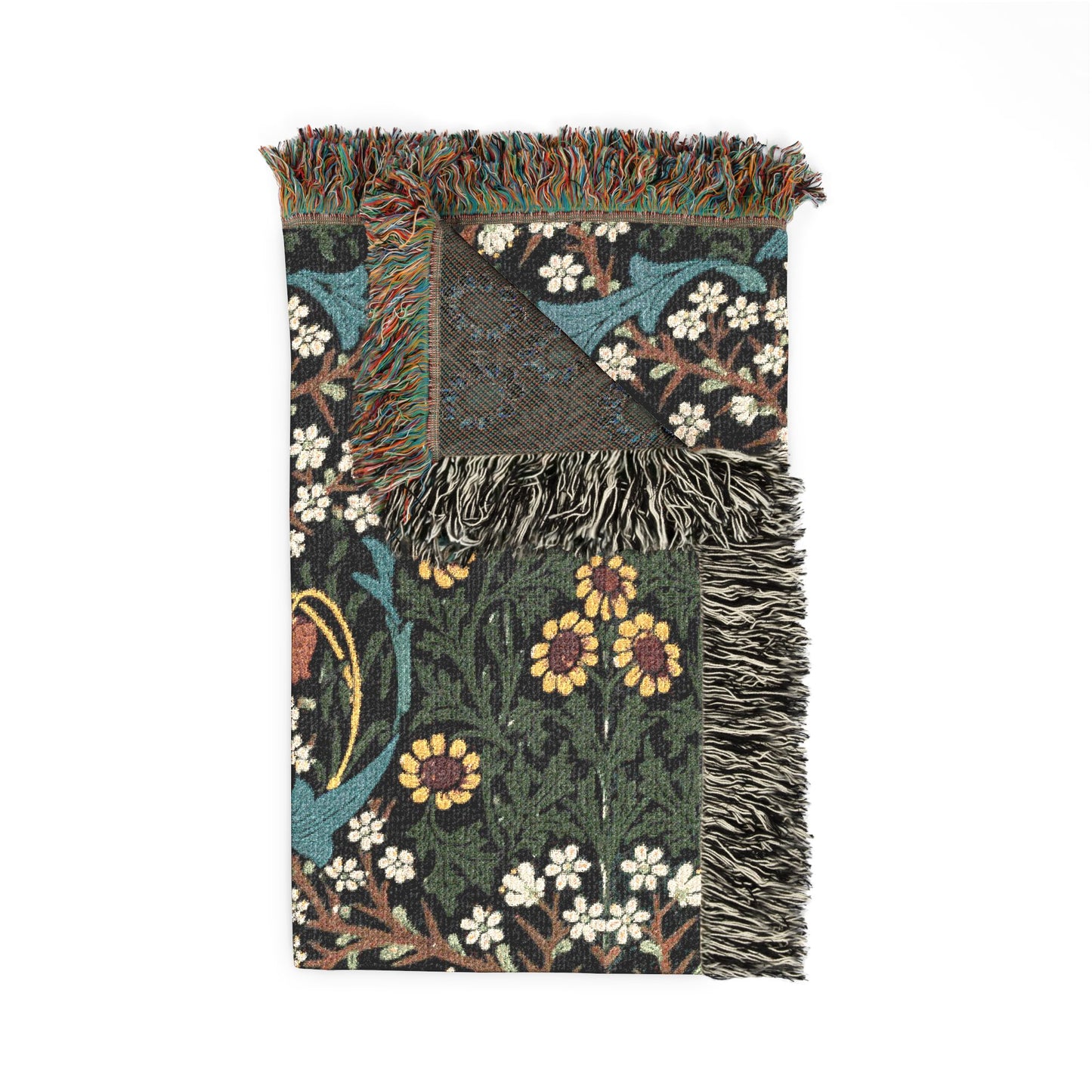 Floral patterned throw blanket with fringe on a white background
