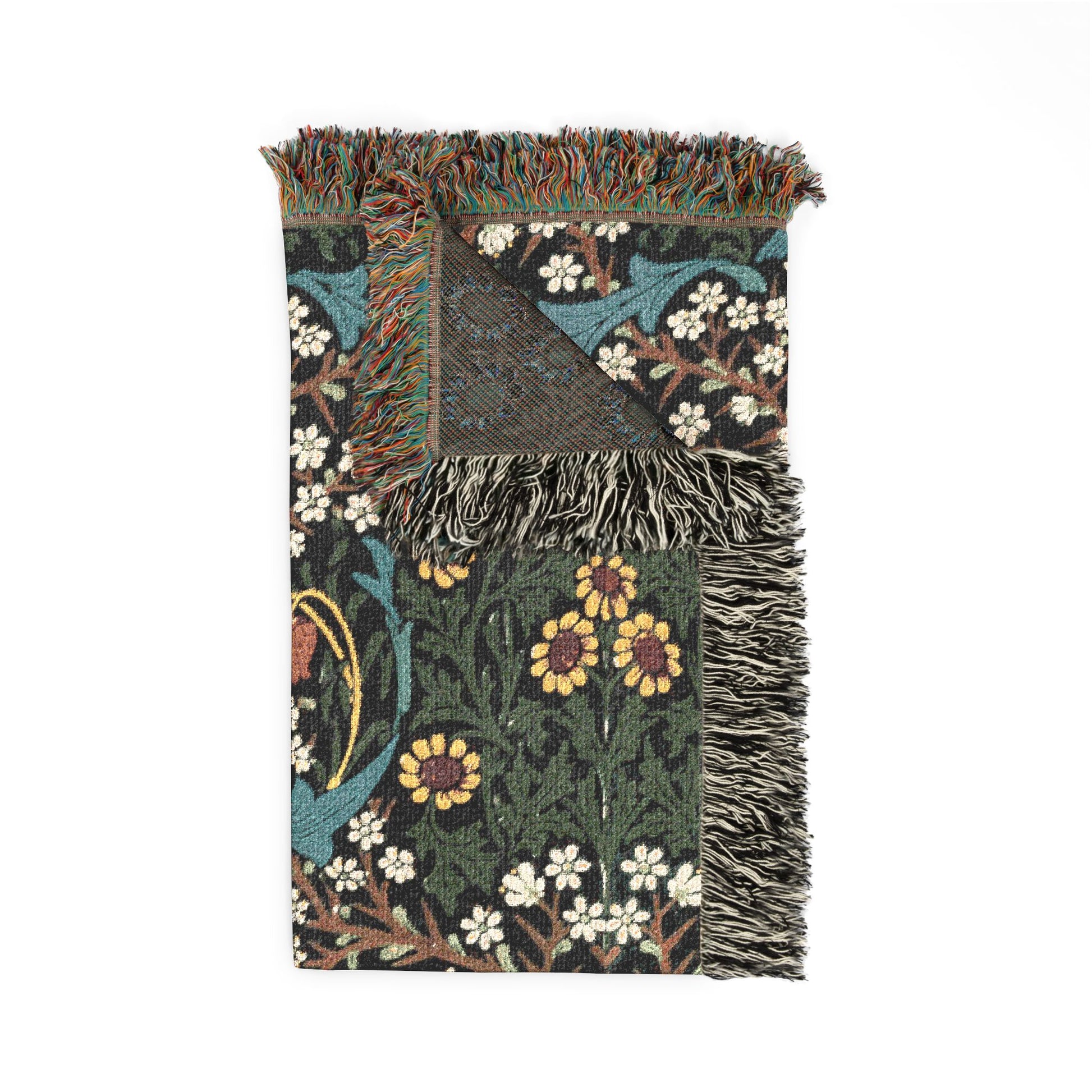 Floral patterned throw blanket with fringe on a white background