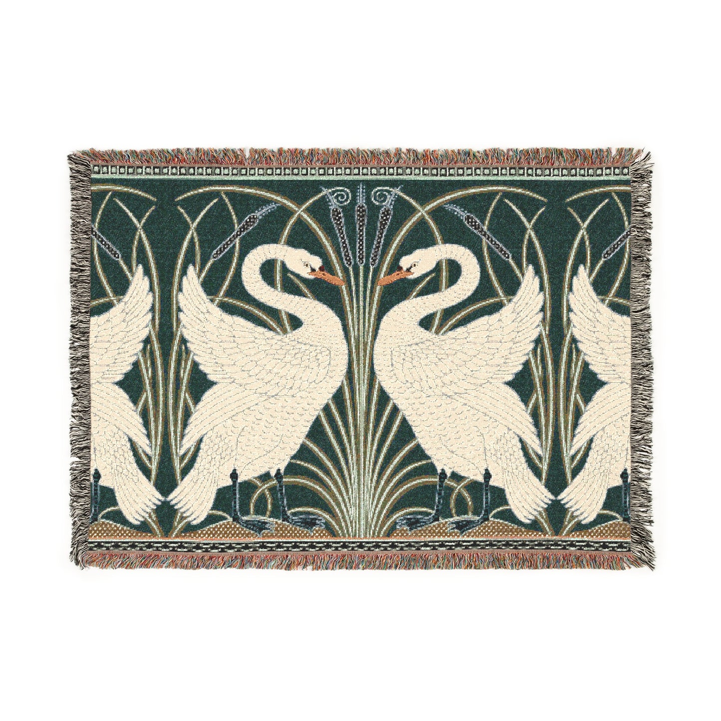 A woven cotton blanket with a geometric William Morris & Co pattern featuring swan motifs in a white and green colour scheme with colourful fringed edges.