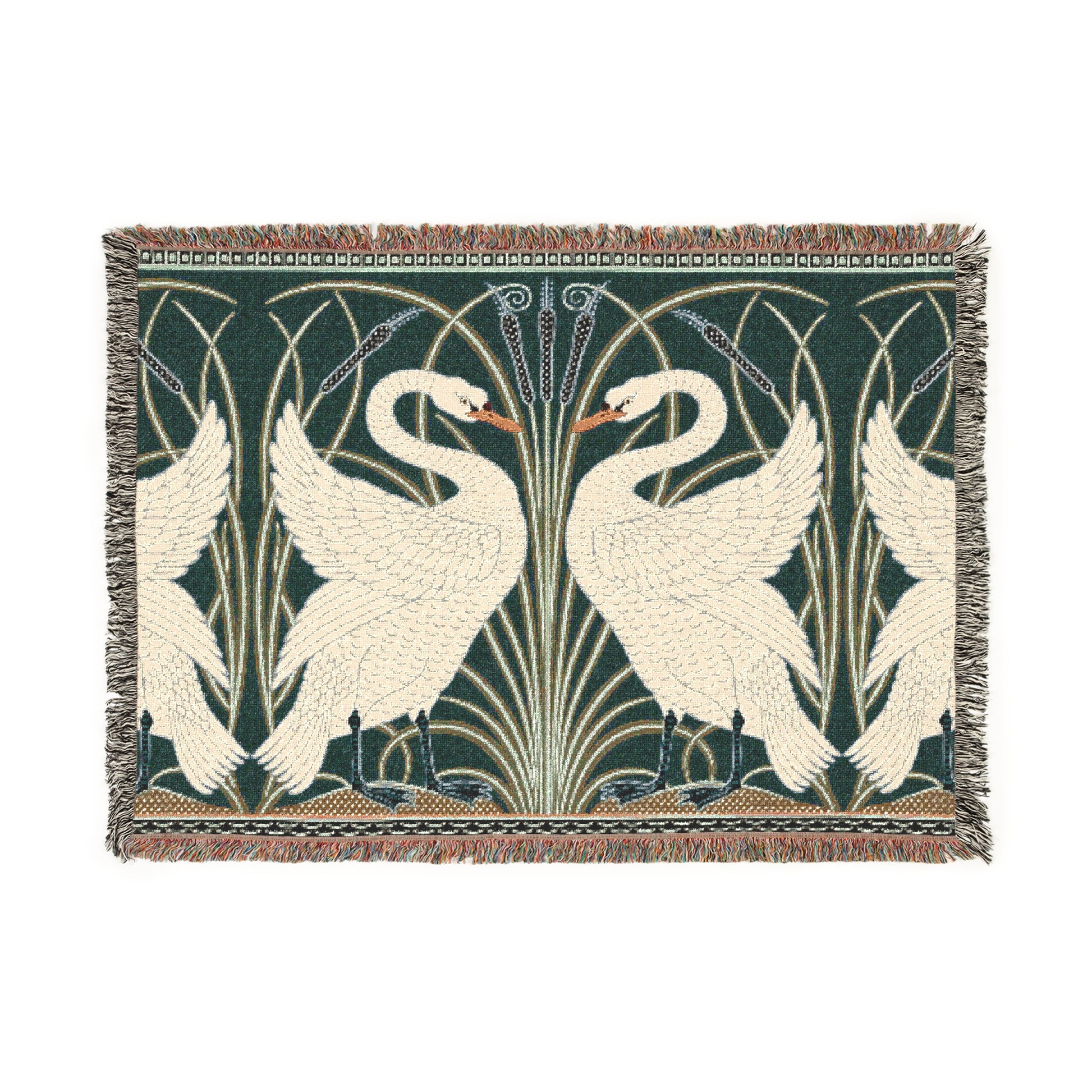 A woven cotton blanket with a geometric William Morris & Co pattern featuring swan motifs in a white and green colour scheme with colourful fringed edges.