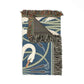 Decorative throw blanket with swan design on a white background