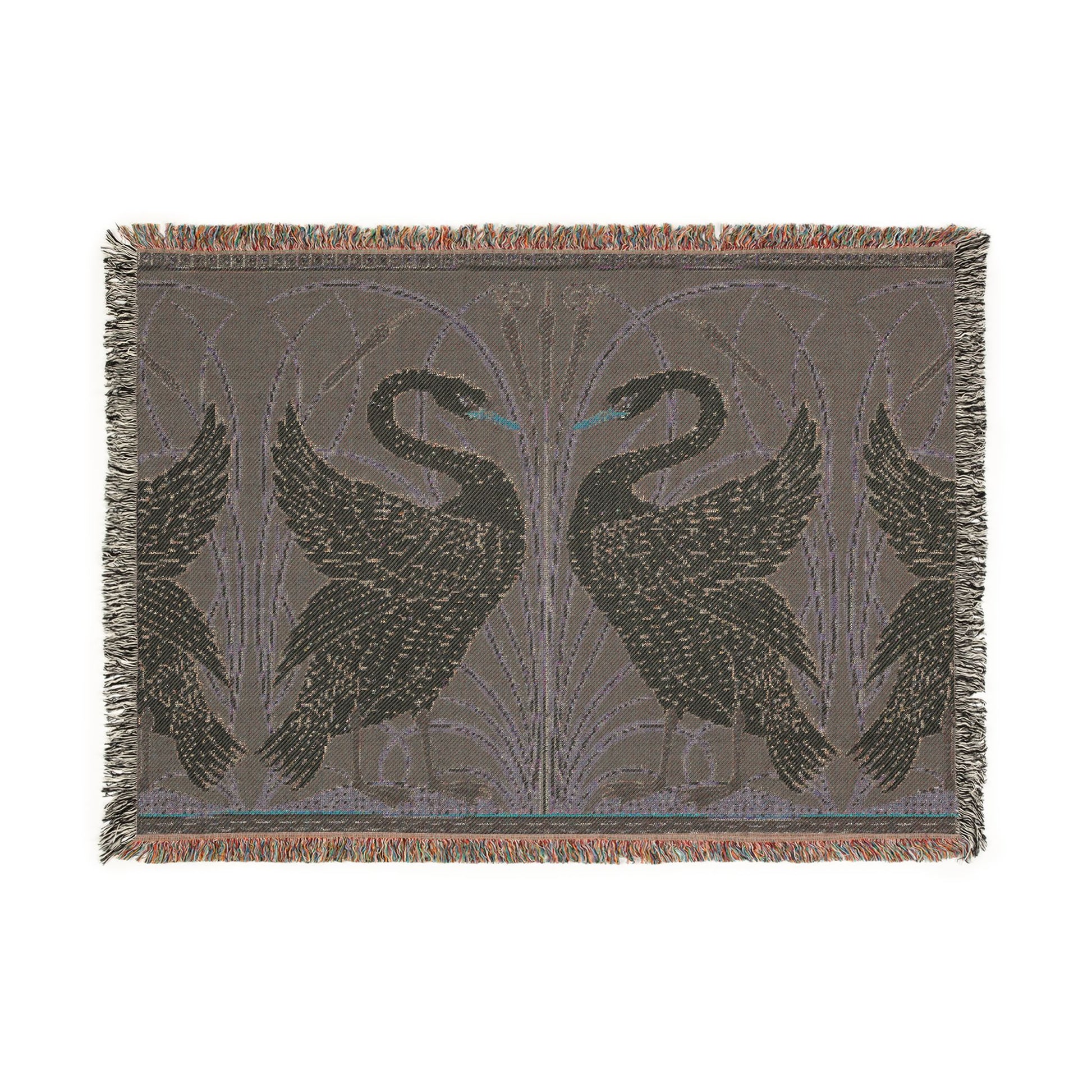 Woven blanket with swan design on a plain background