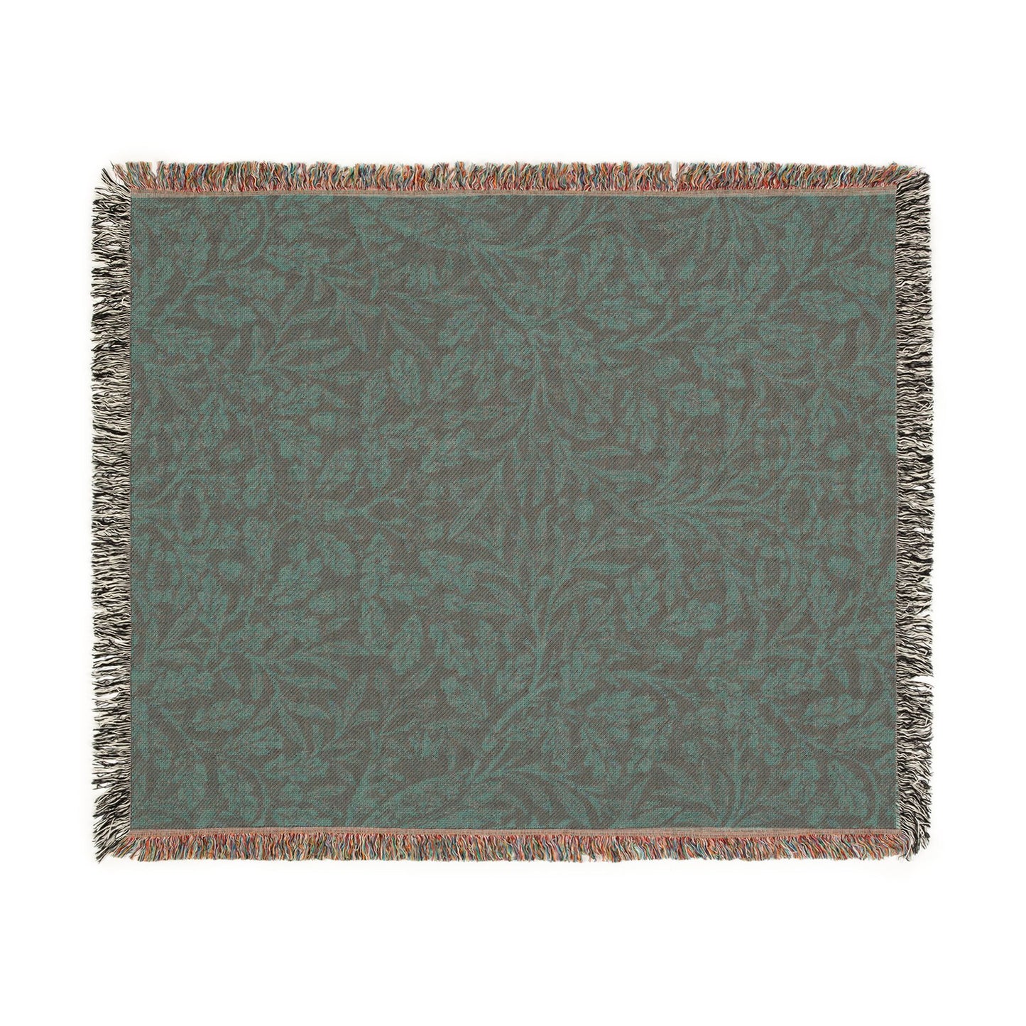 Textured green blanket with leaf pattern on a white background