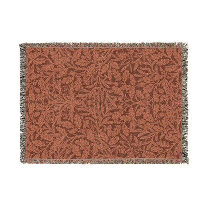 Patterned blanket with leaf design on a white background