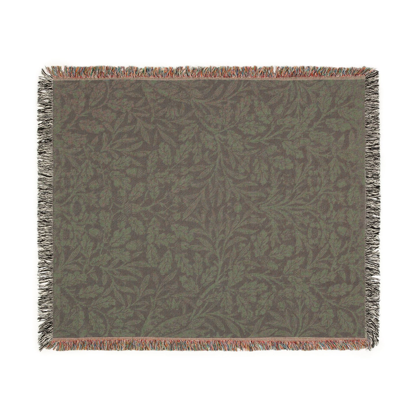 Green woven blanket with leaf pattern on a white background