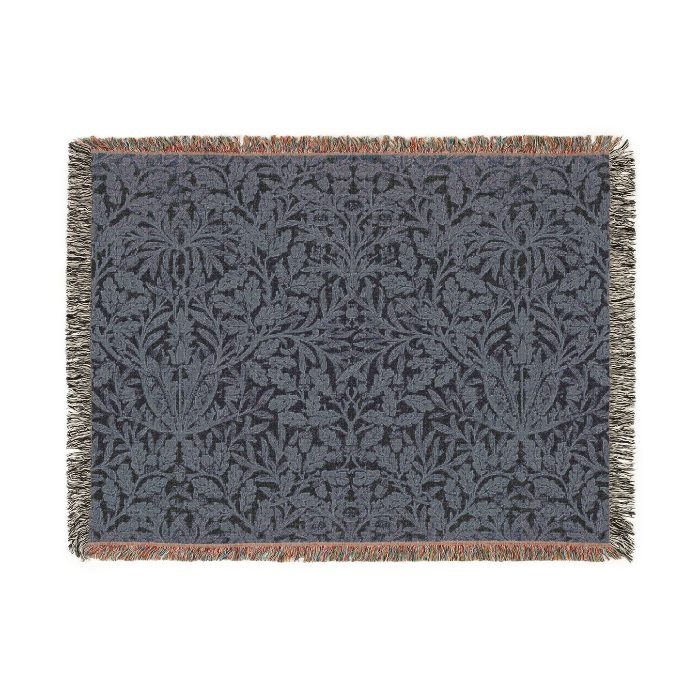 A woven cotton blanket with a geometric pattern in smoky blue color, featuring fringed edges.