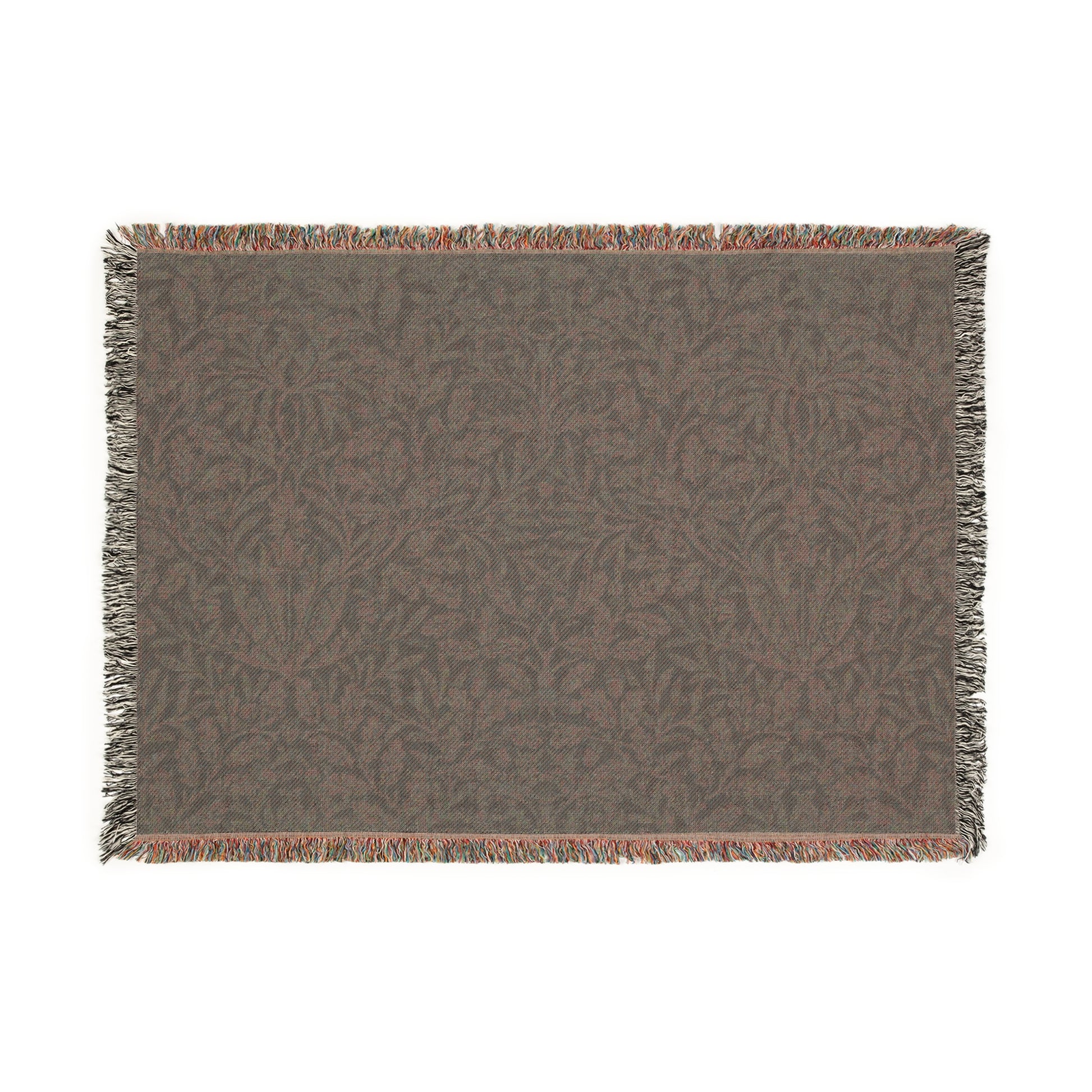 A woven cotton blanket with a geometric William Morris & Co pattern in smoky blue colour, featuring fringed edges.