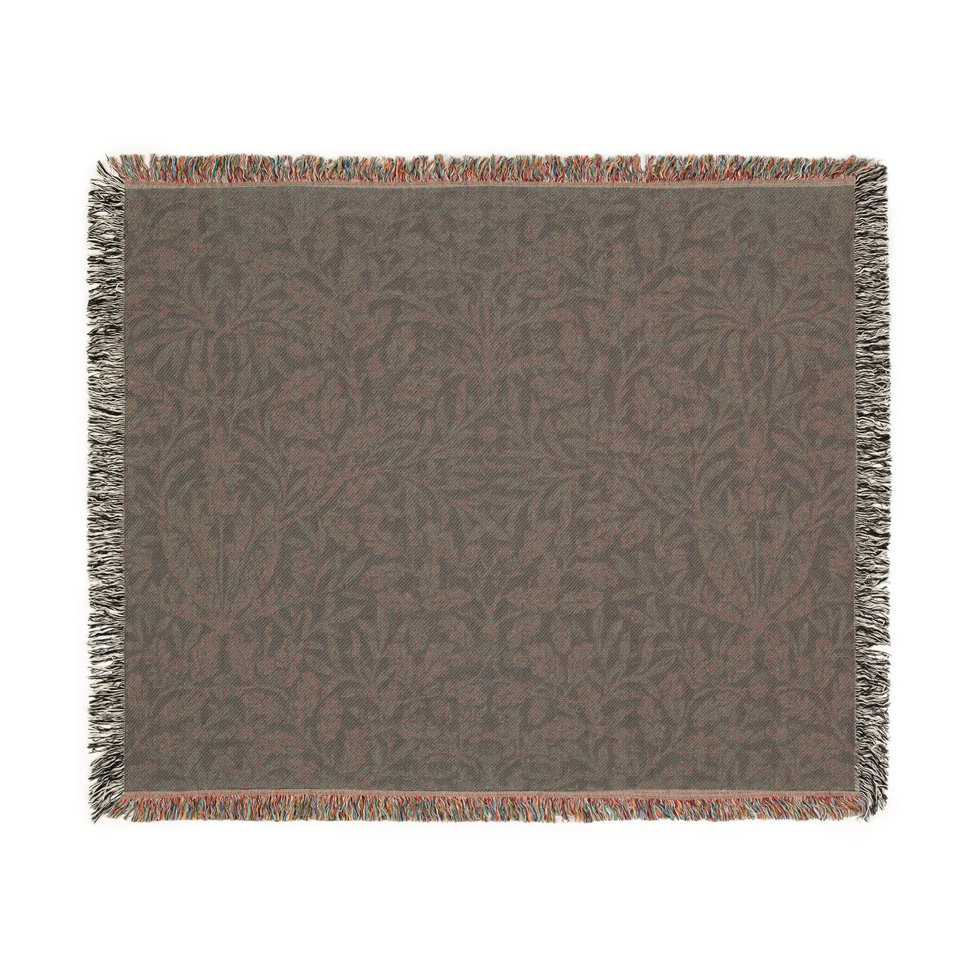 A woven cotton blanket with a geometric William Morris & Co pattern in smoky blue colour, featuring fringed edges.