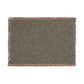 Green patterned throw blanket with fringe on a white background