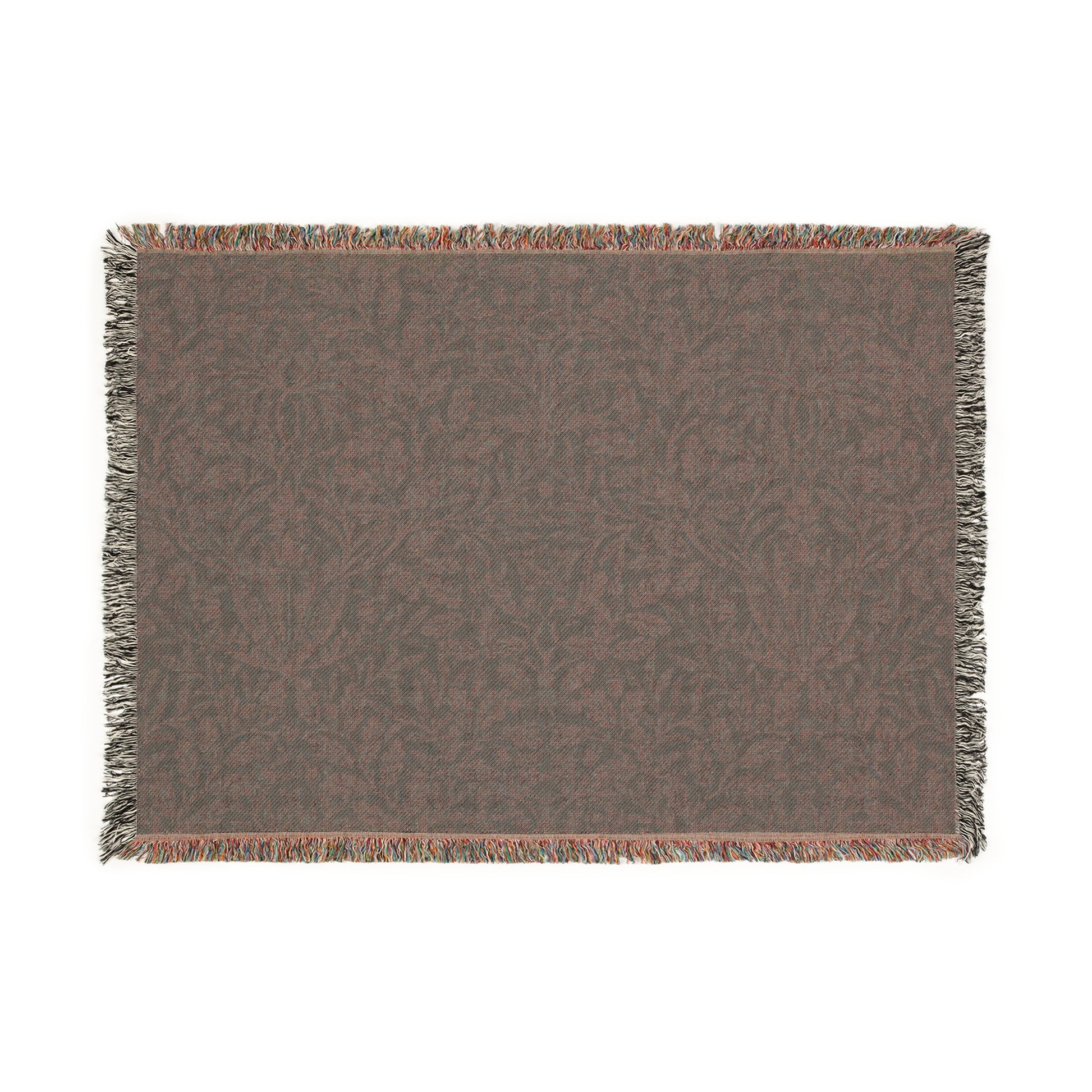 A woven cotton blanket with a William Morris & Co floral geometric pattern in teal colour, featuring a fringe.